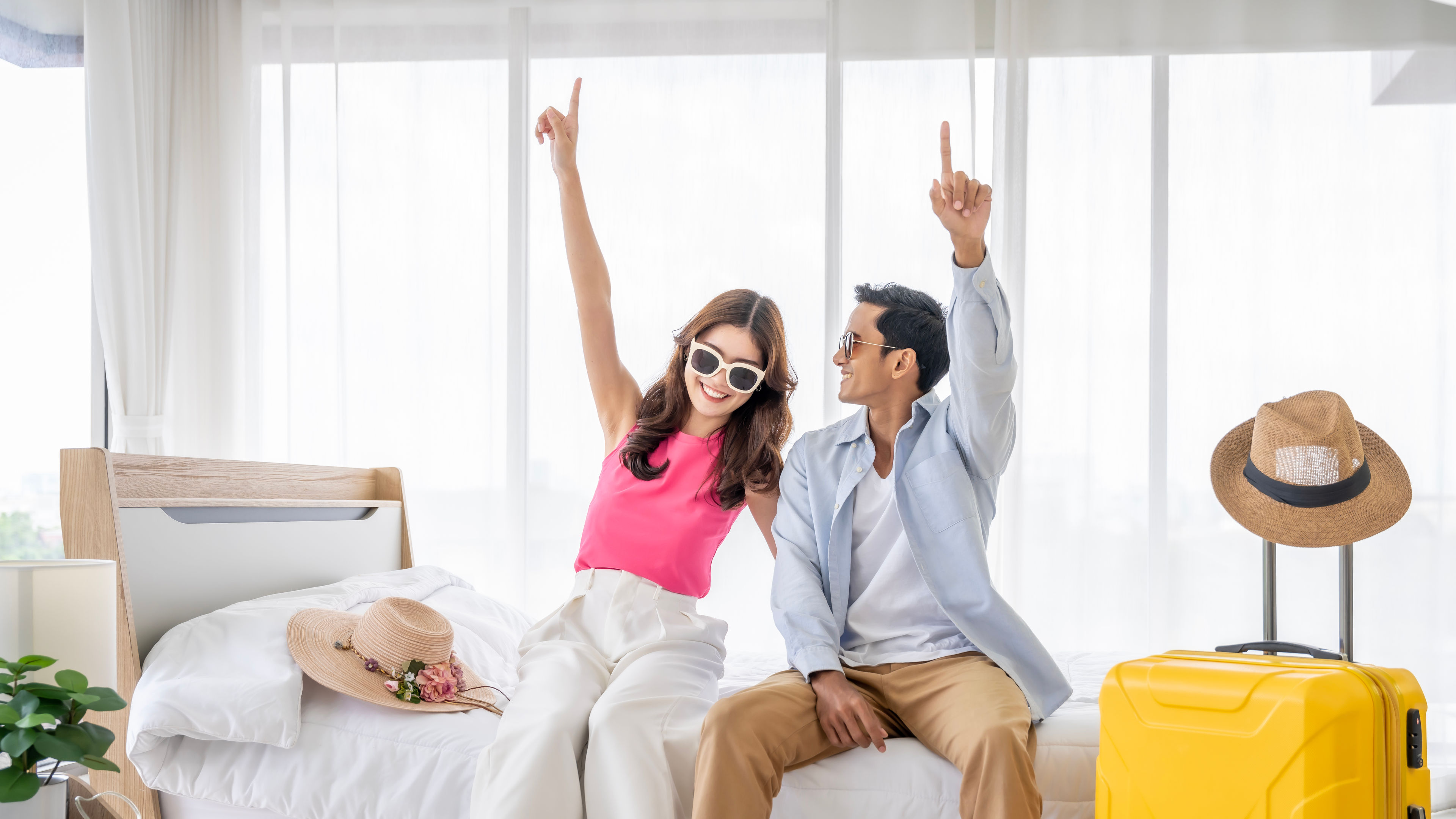 Excited Couple Ready to Travel on Vacation
