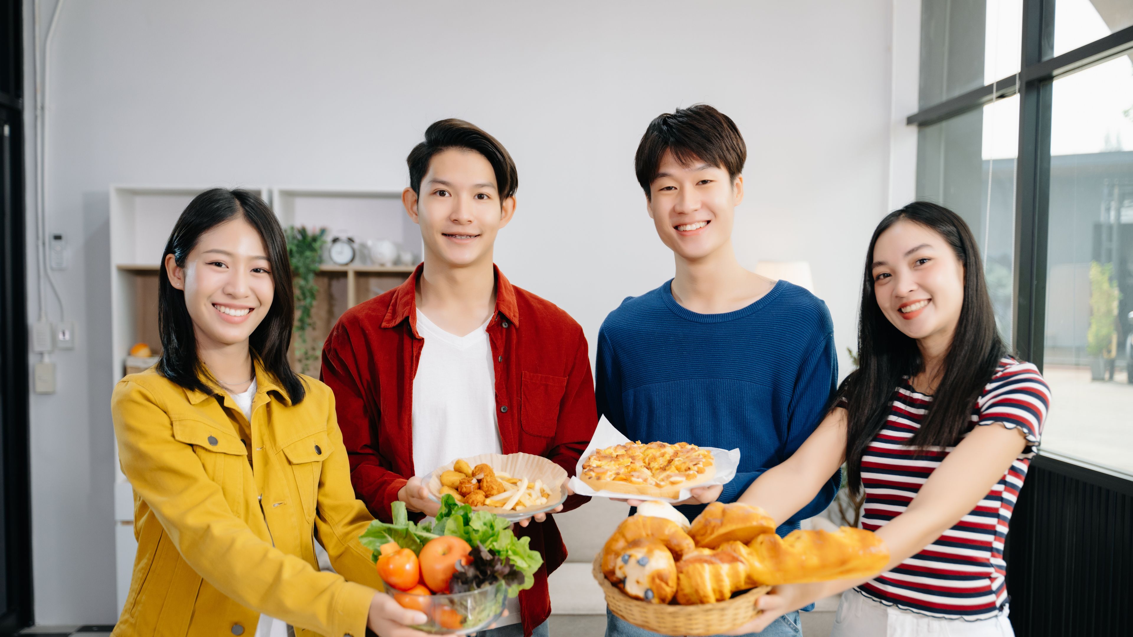 Young happy Asian friends