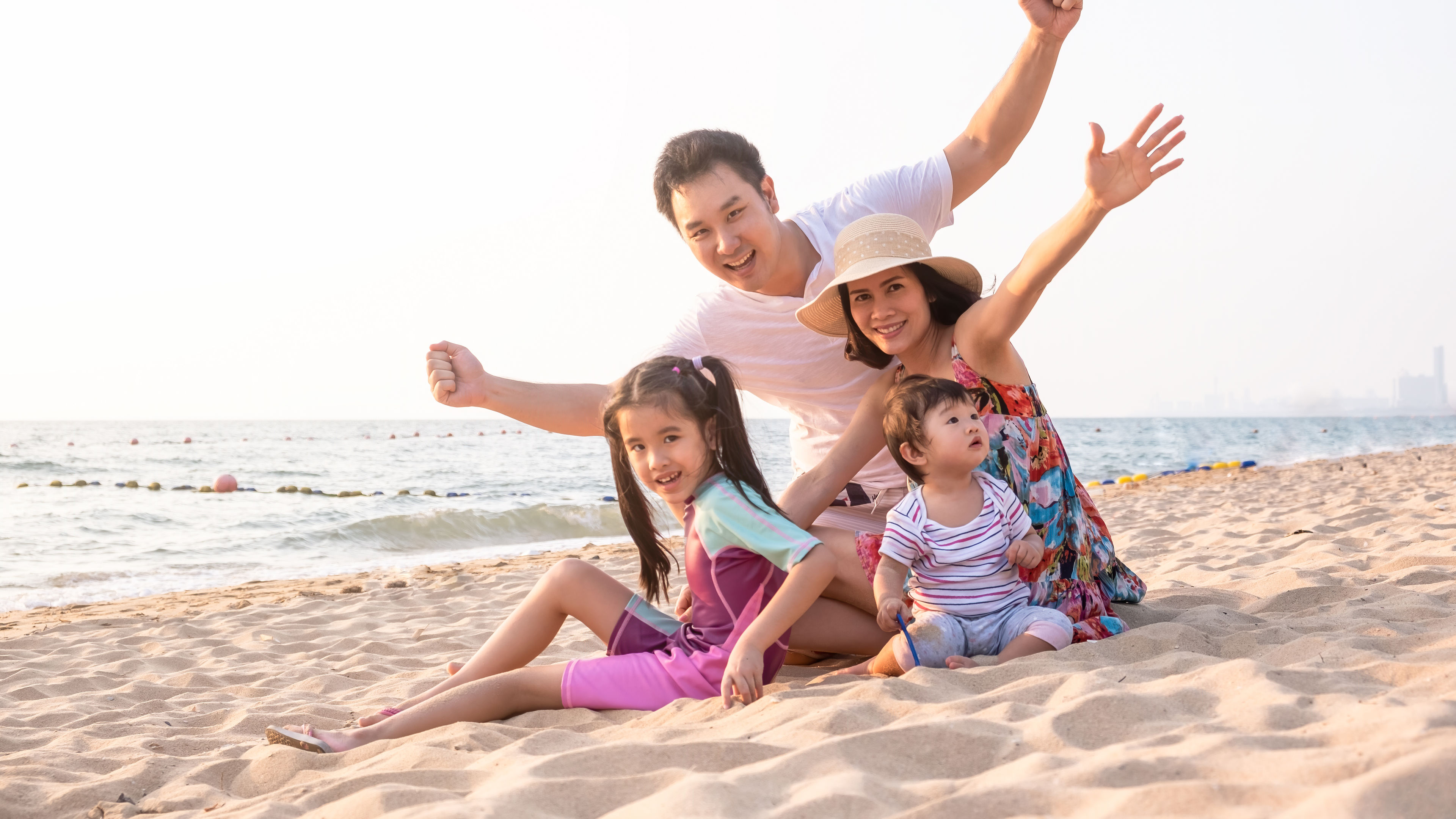 A cheerful family at the beach