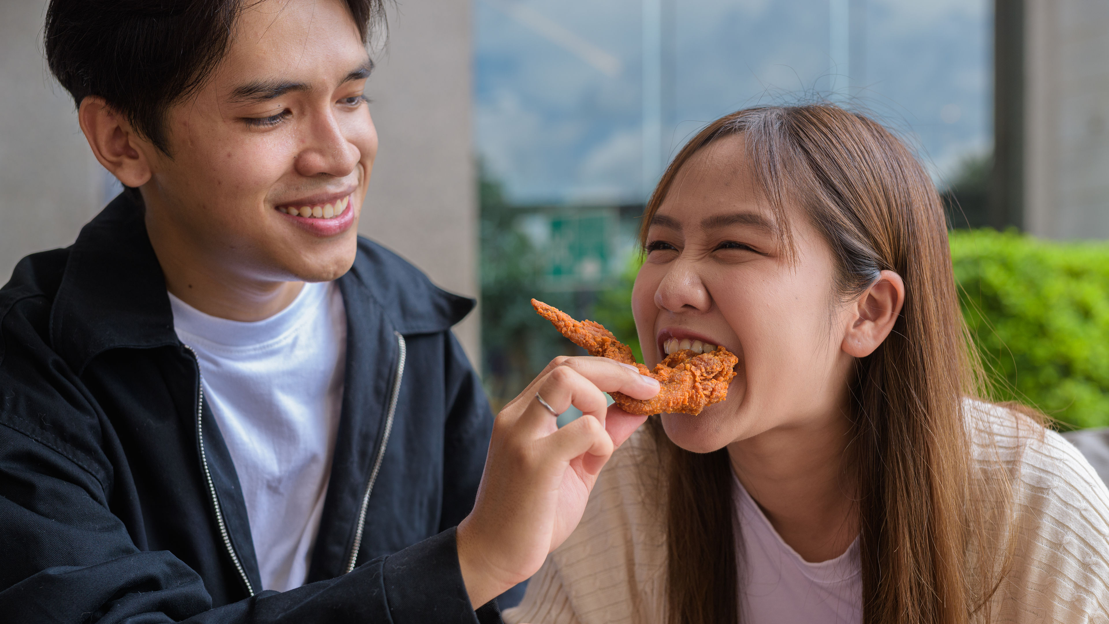 A couple enjoying food