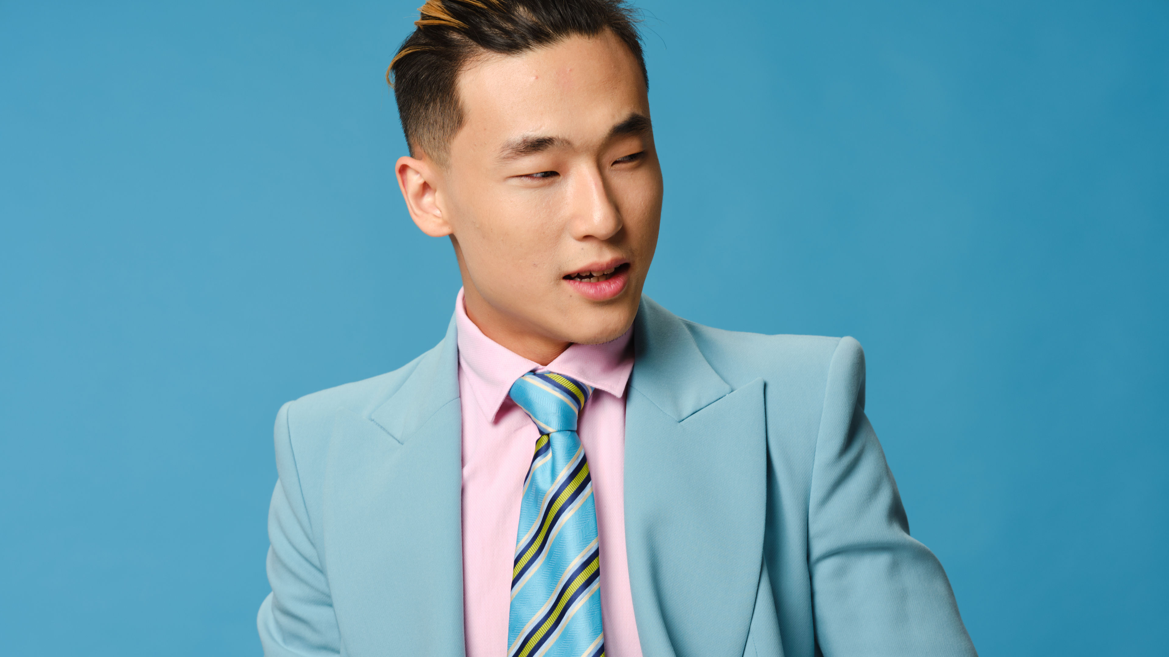 A man in blue tie