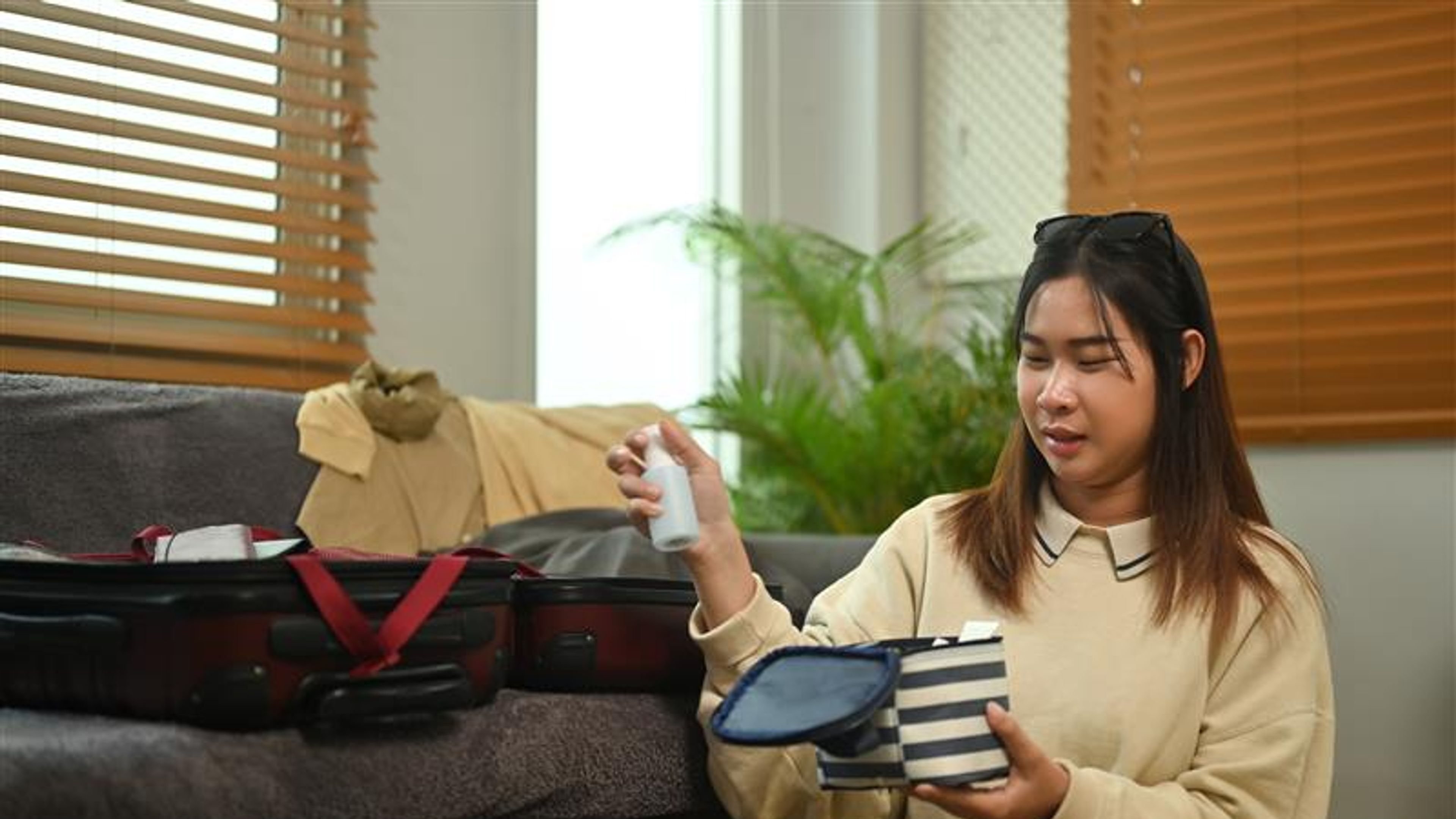 A woman getting ready for a trip