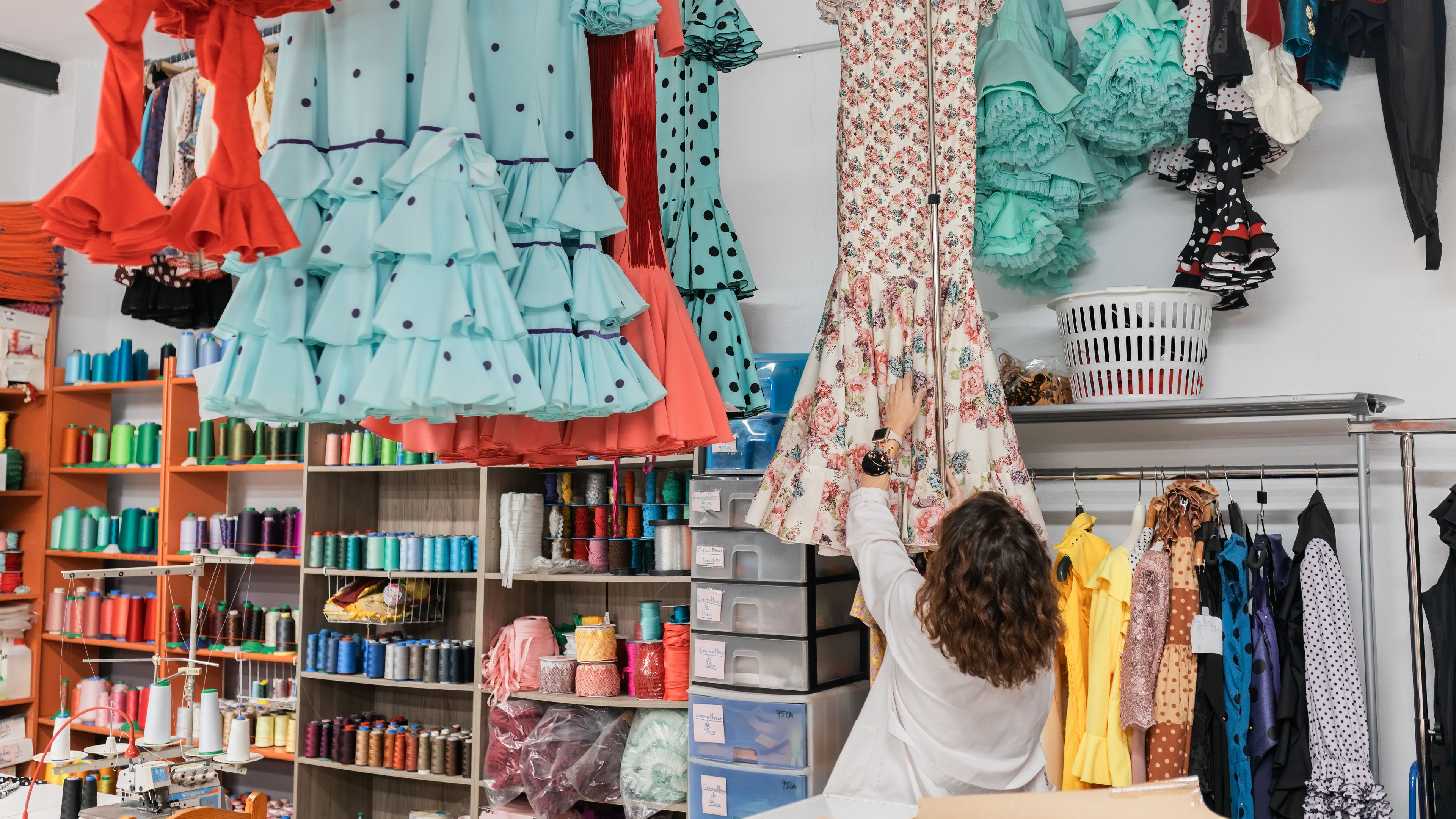 Woman carefully picks her favorite item. 
