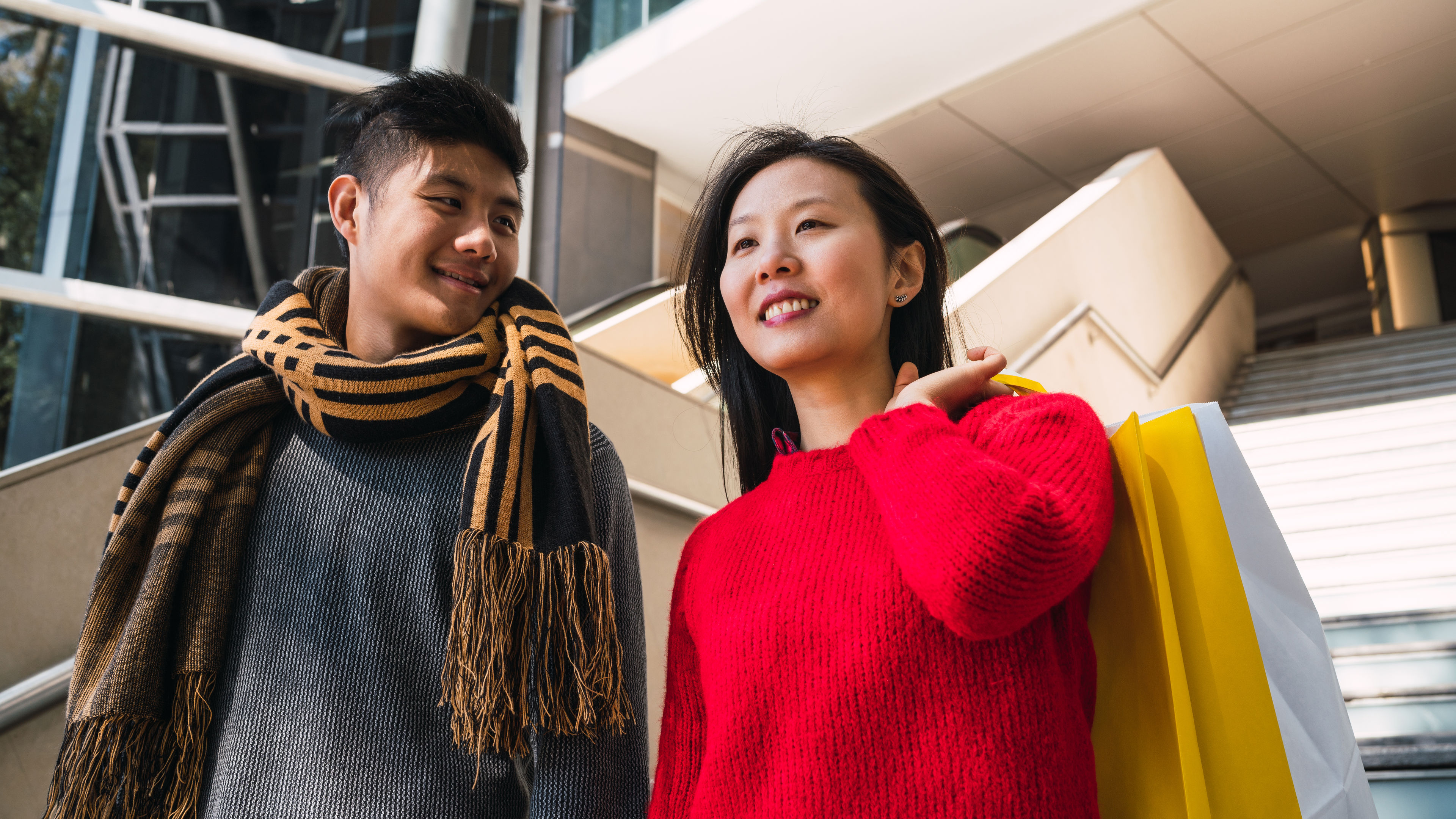 Asian couple shopping in the mall