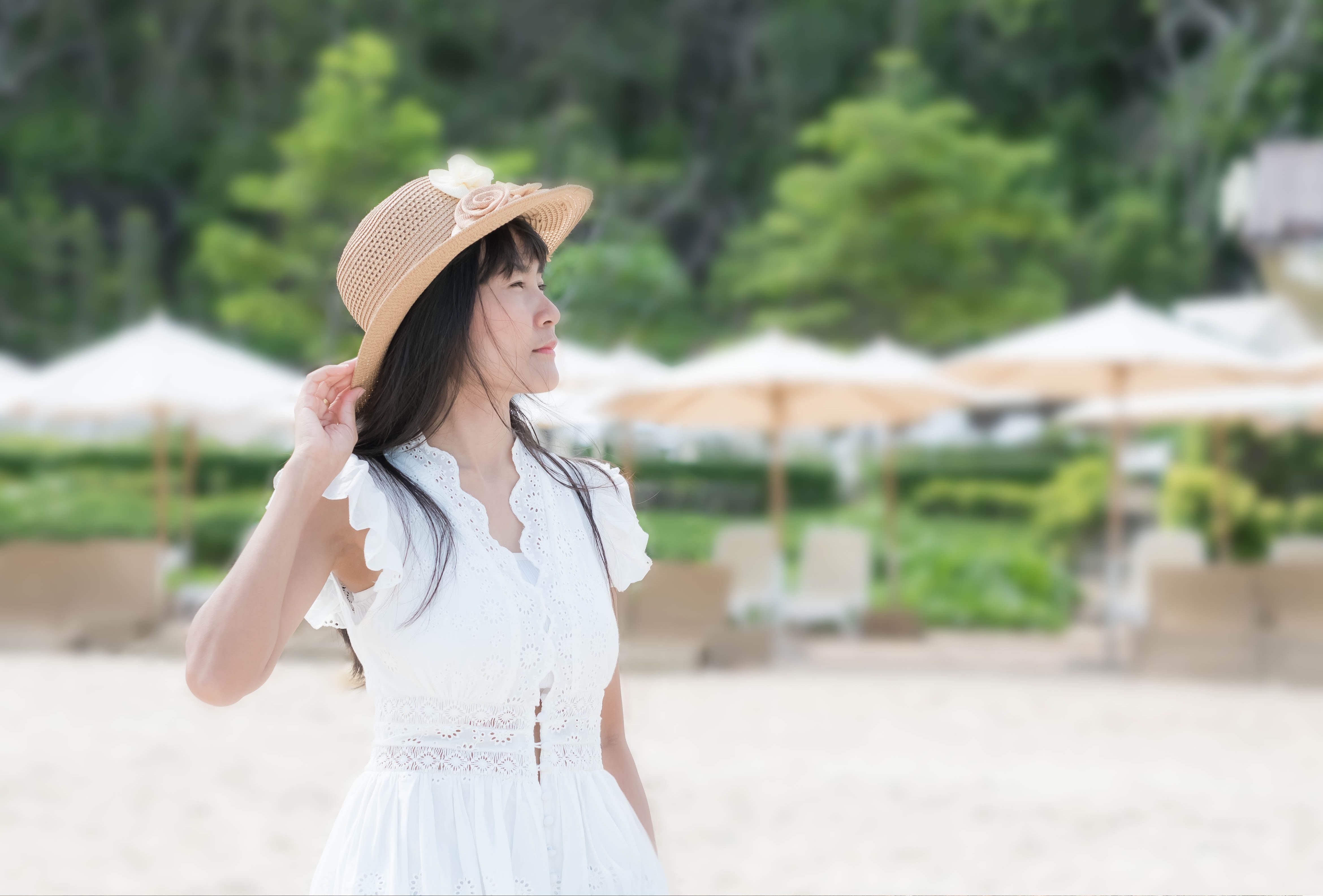Image of an asian woman on beach 

