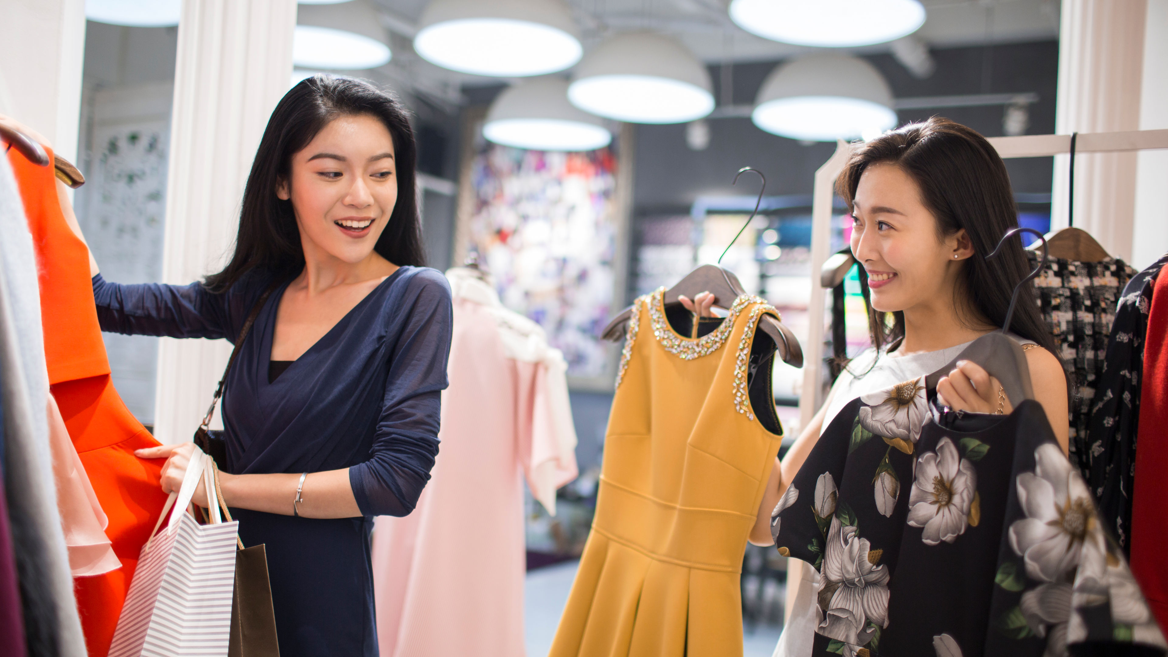 Image of Best friends shopping clothes 