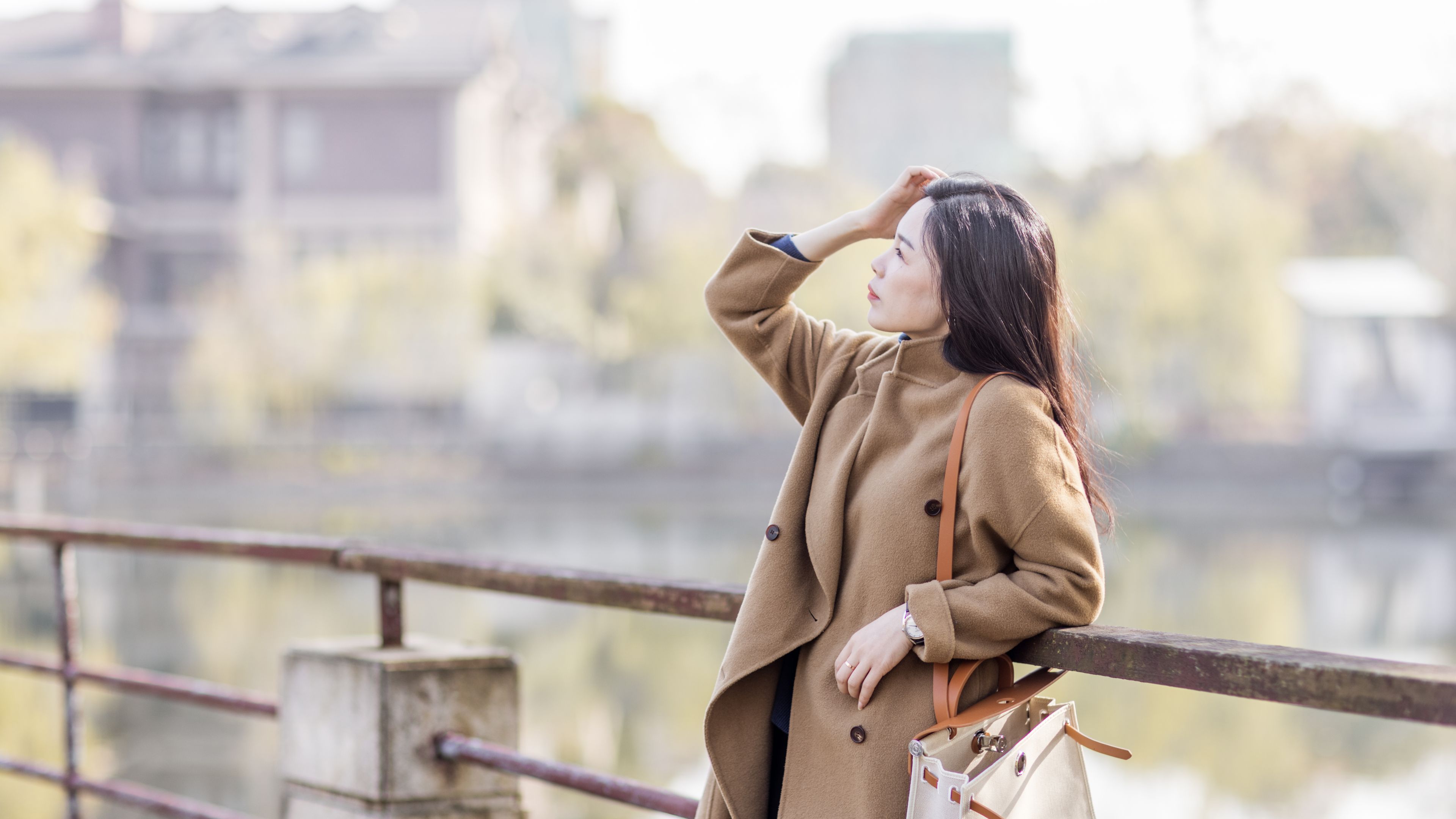 A vibrant lifestyle portrait of a young Asian woman exuding confidence and charm