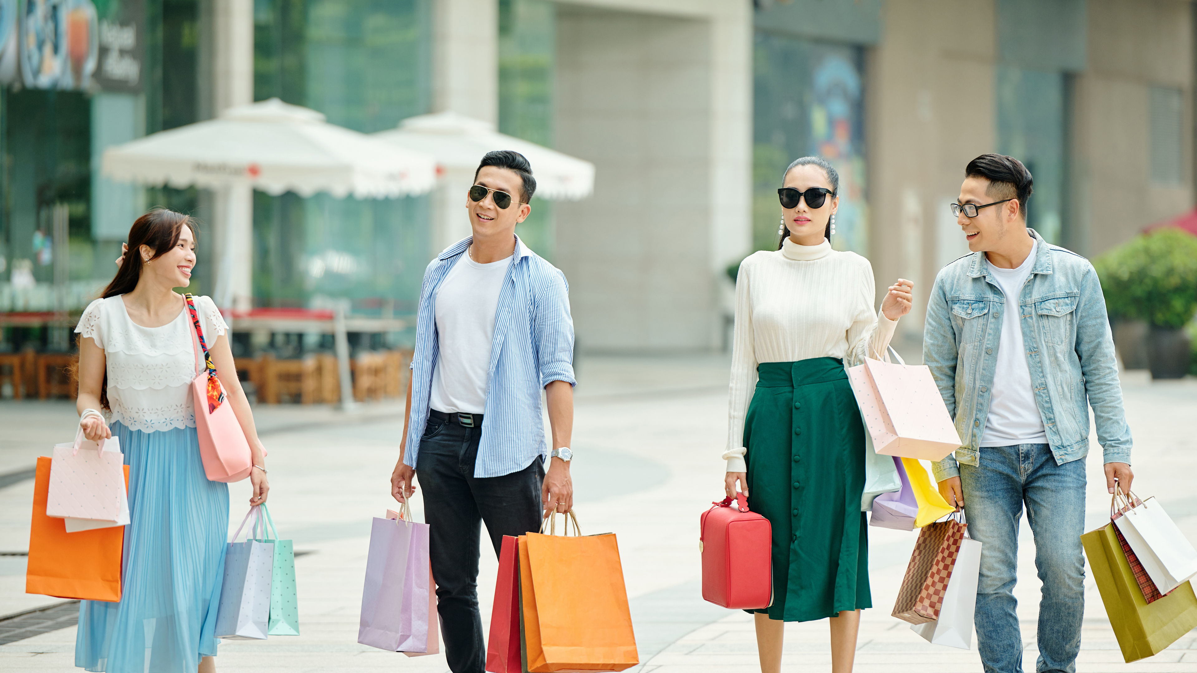 Cheerful people after shopping 
