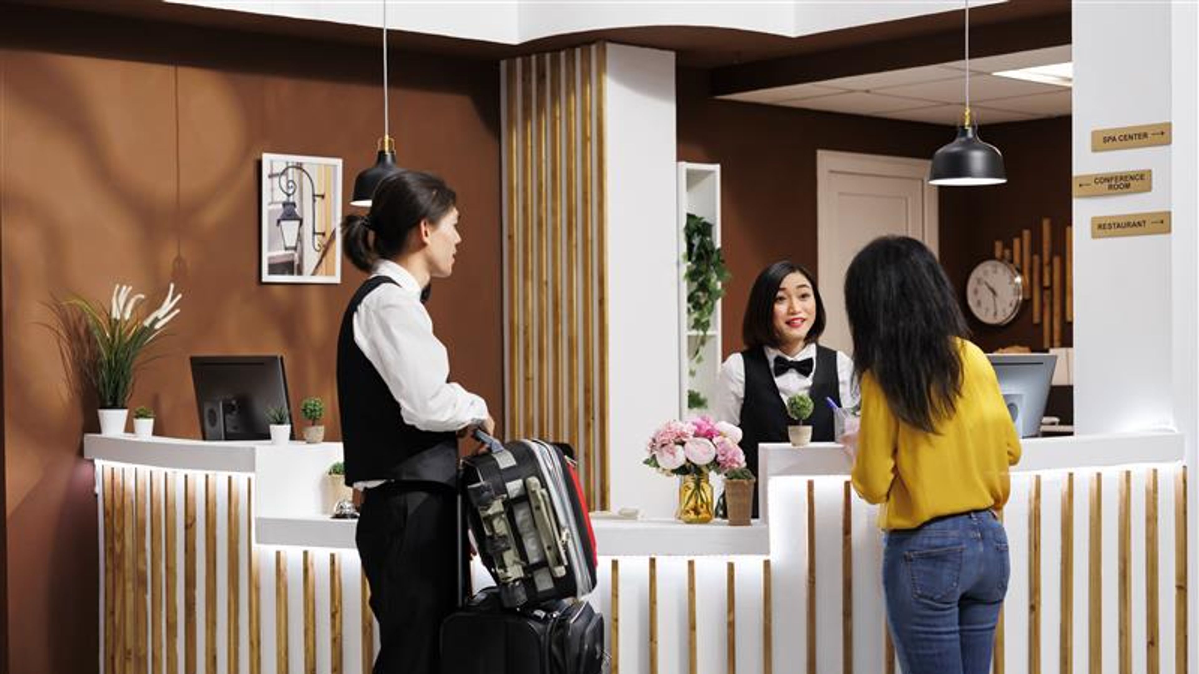 Customer enquiring at hotel reception 