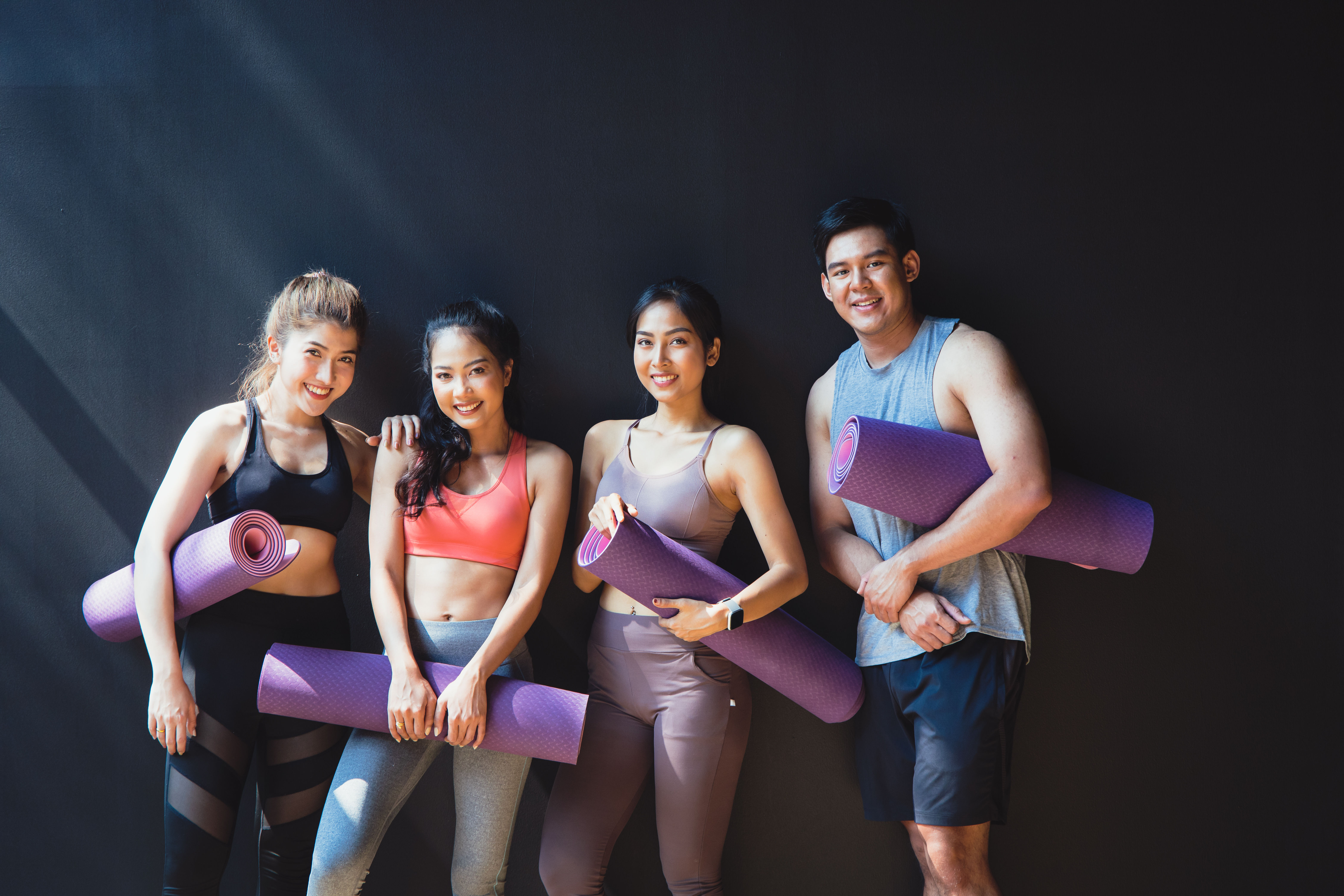 Image of Group of people with yoga mat 