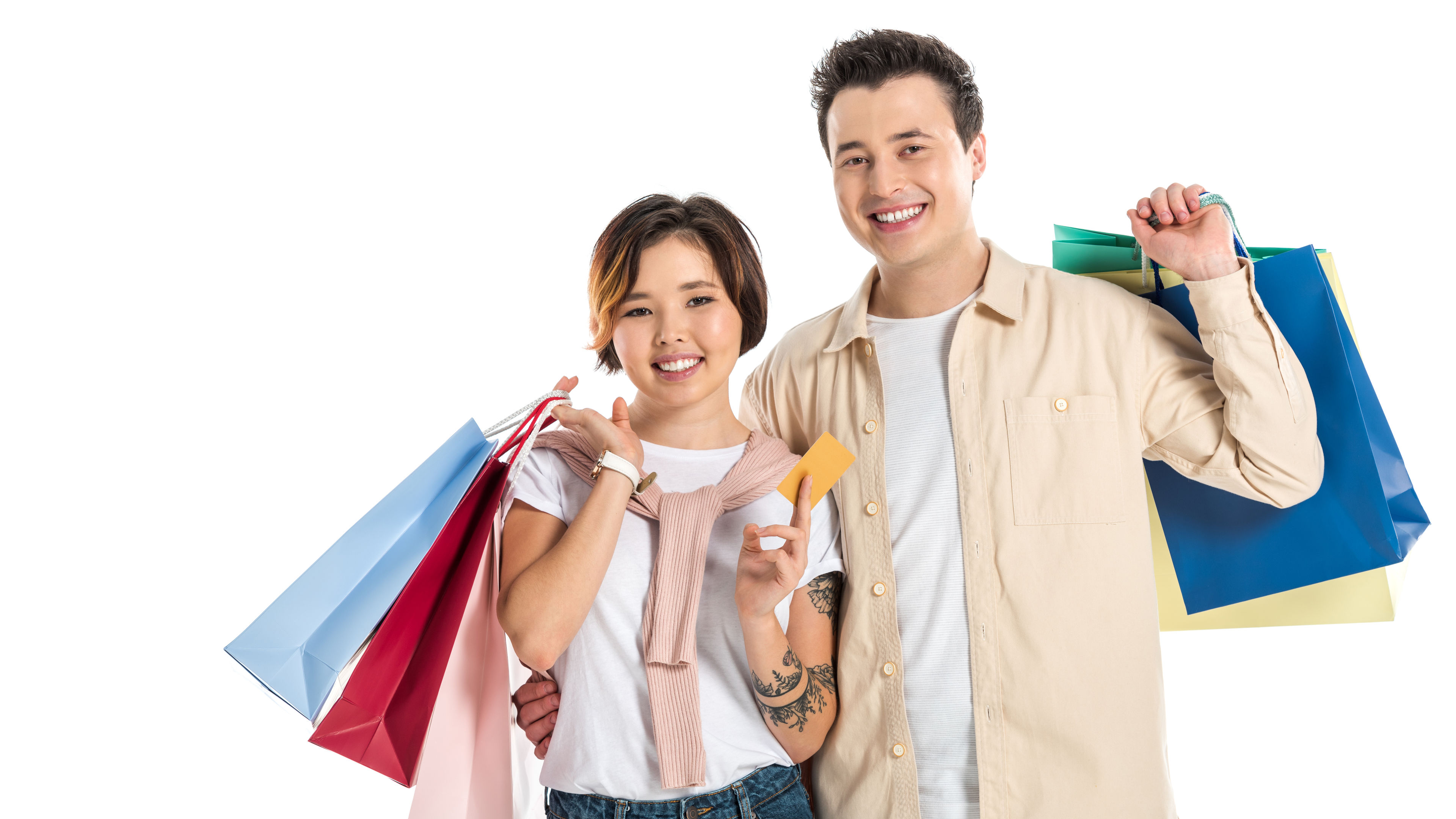 happy couple holding shopping bags