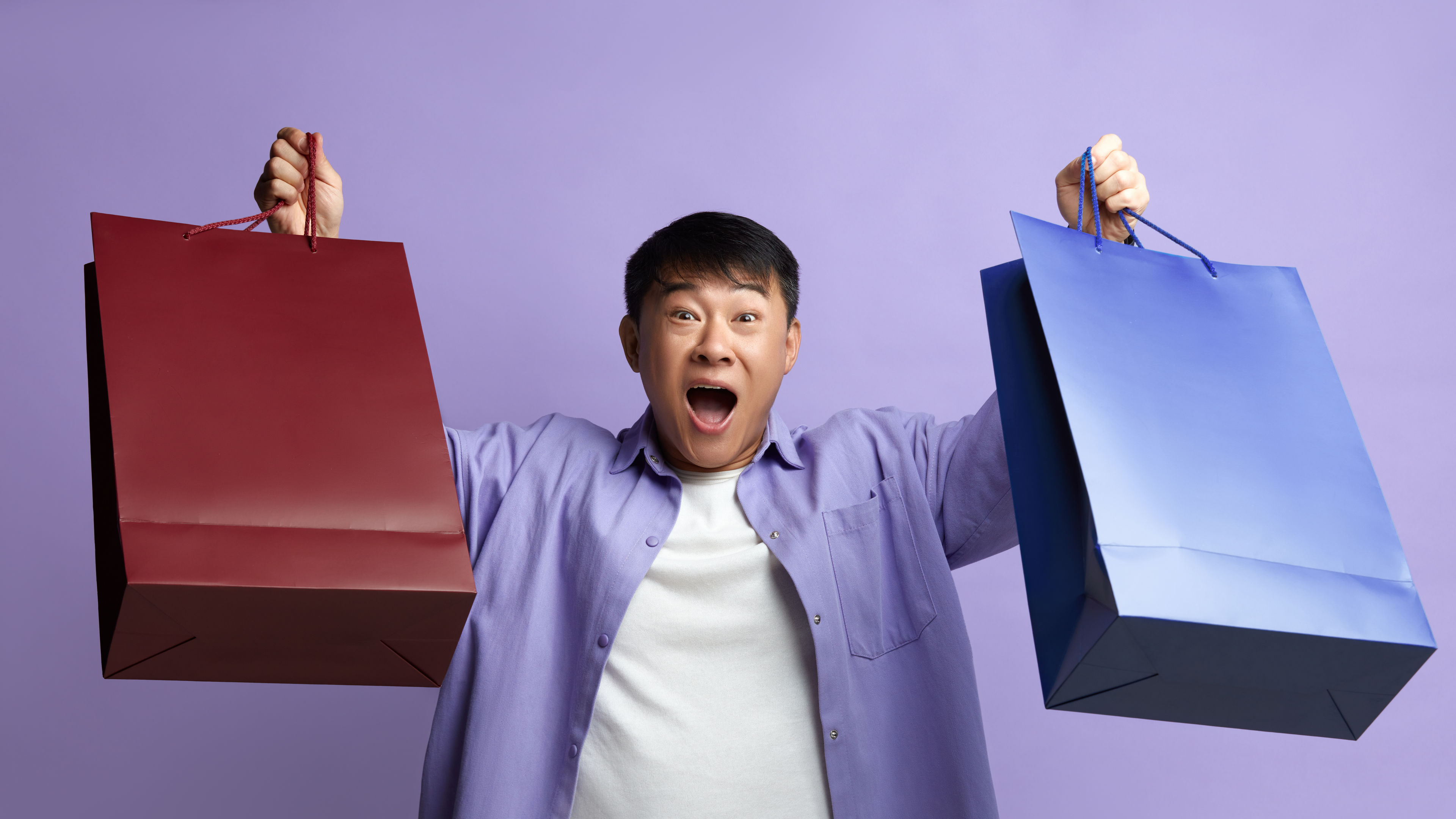Image of a happy man who finished shopping 