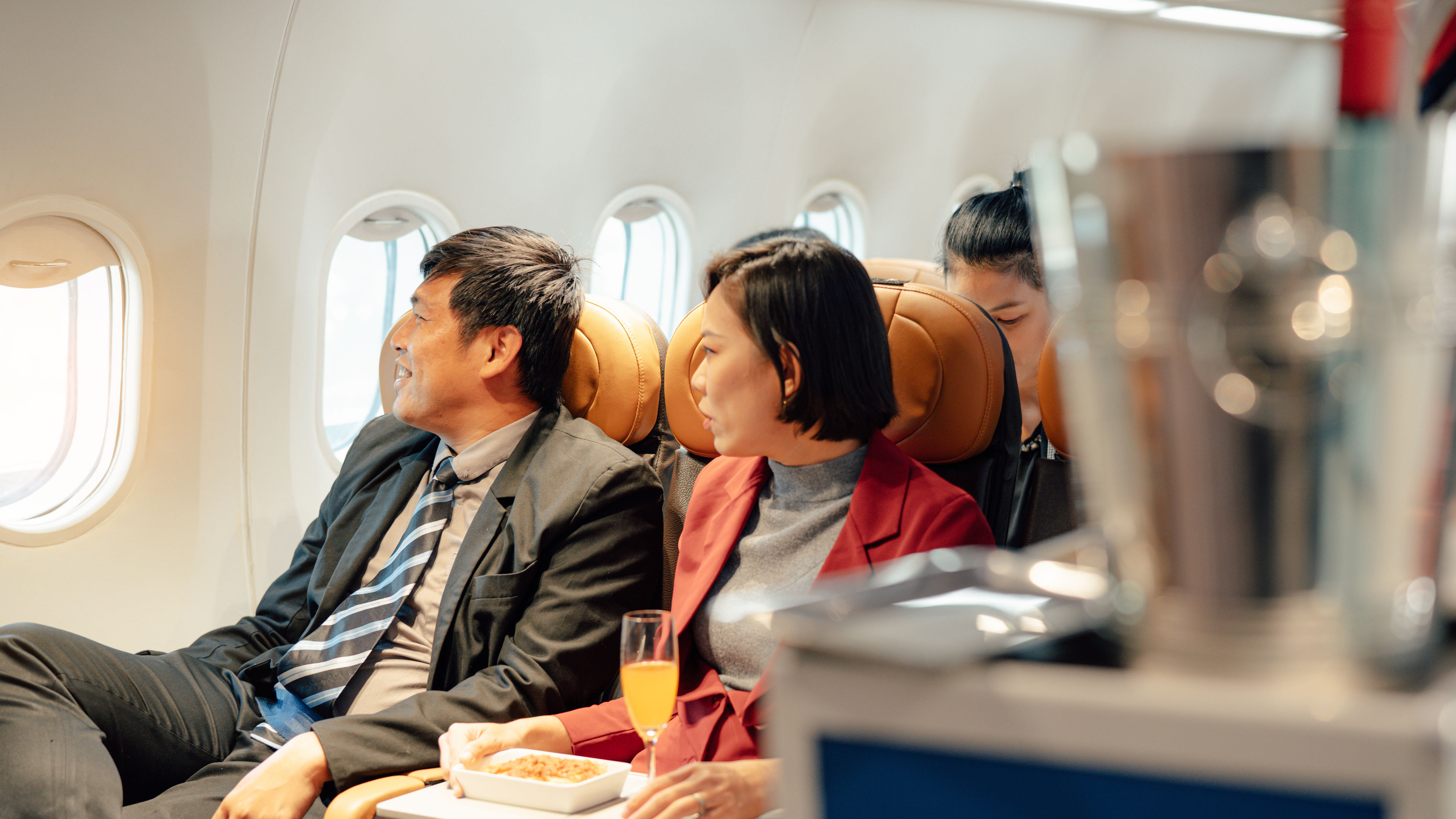 Passengers Enjoying Food and Drinks