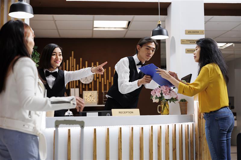 Some people in a hotel reception