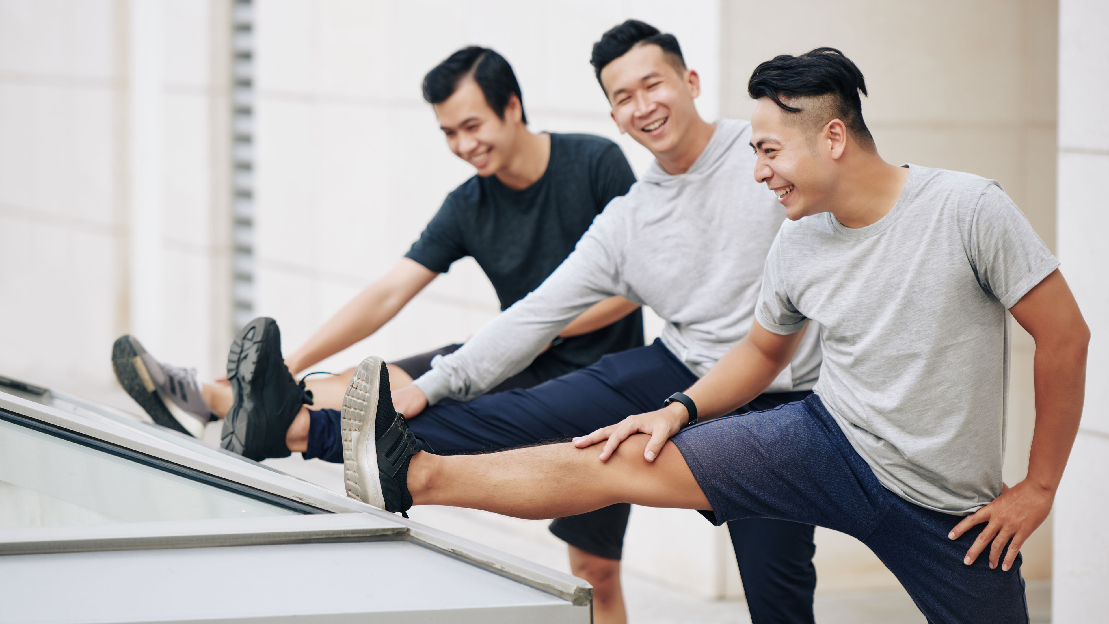 Sportsmen streching their legs