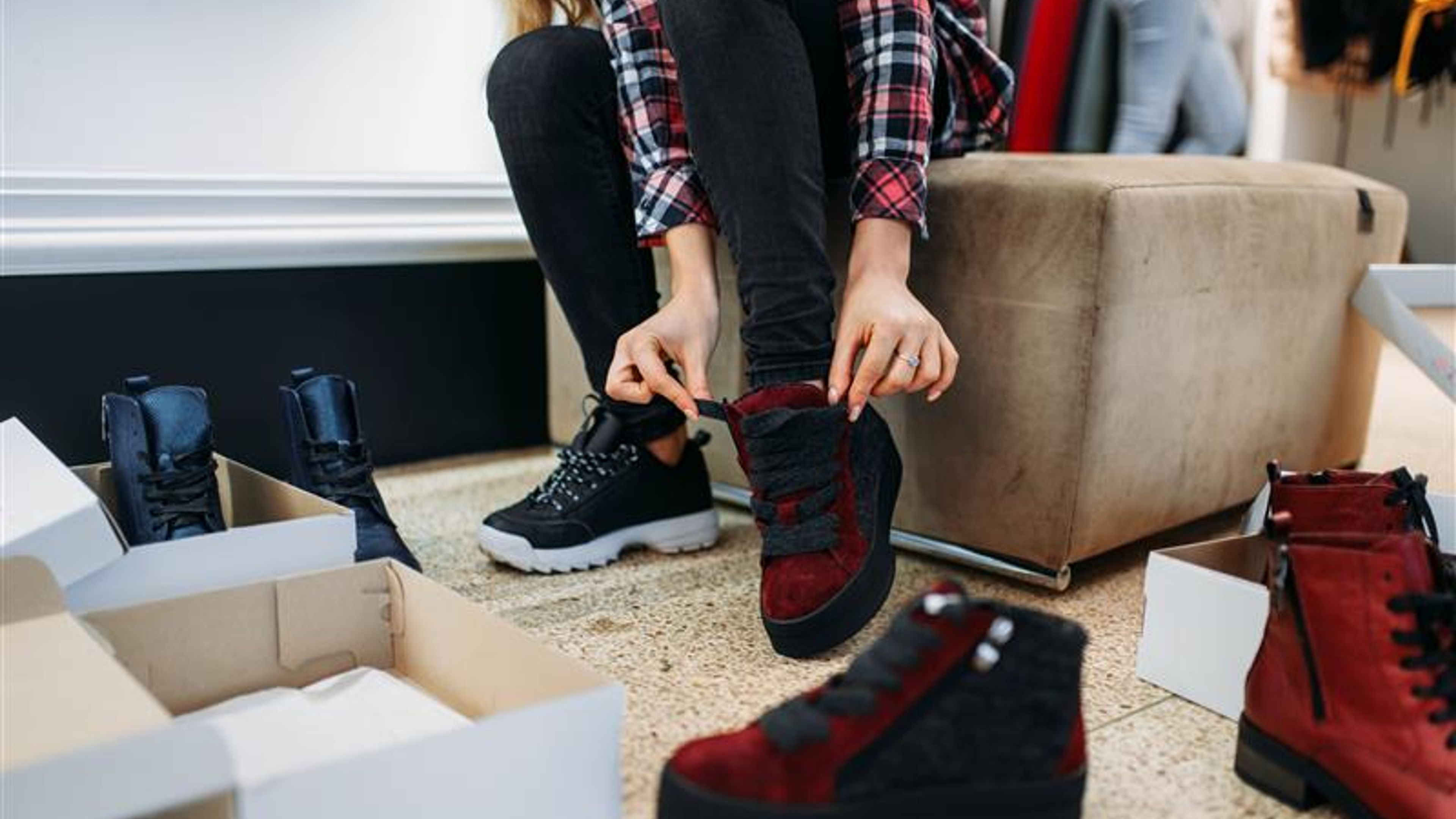 Two girlfriends buying clothes and shoes, shopping