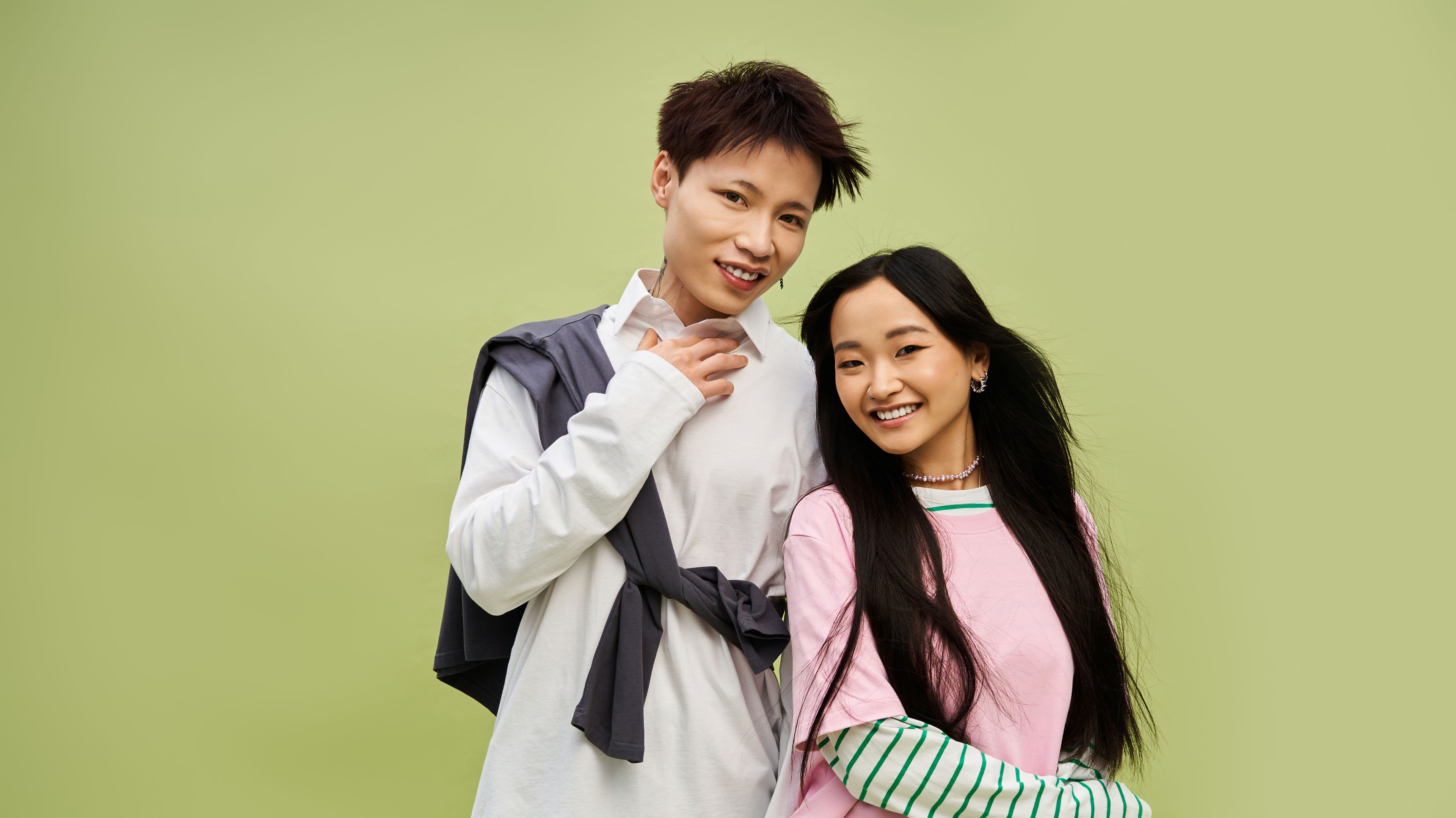 Two students are smiling