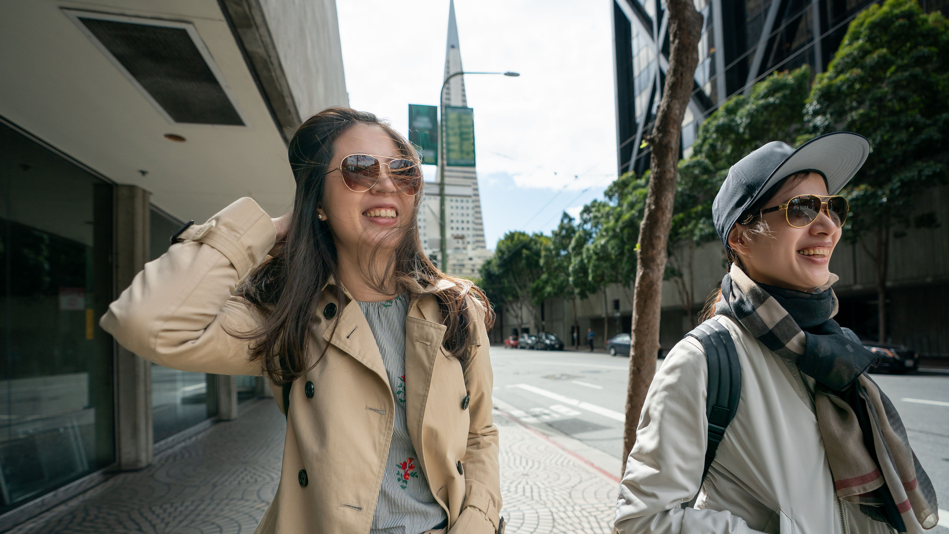 Two woman well-dressed walking on the street