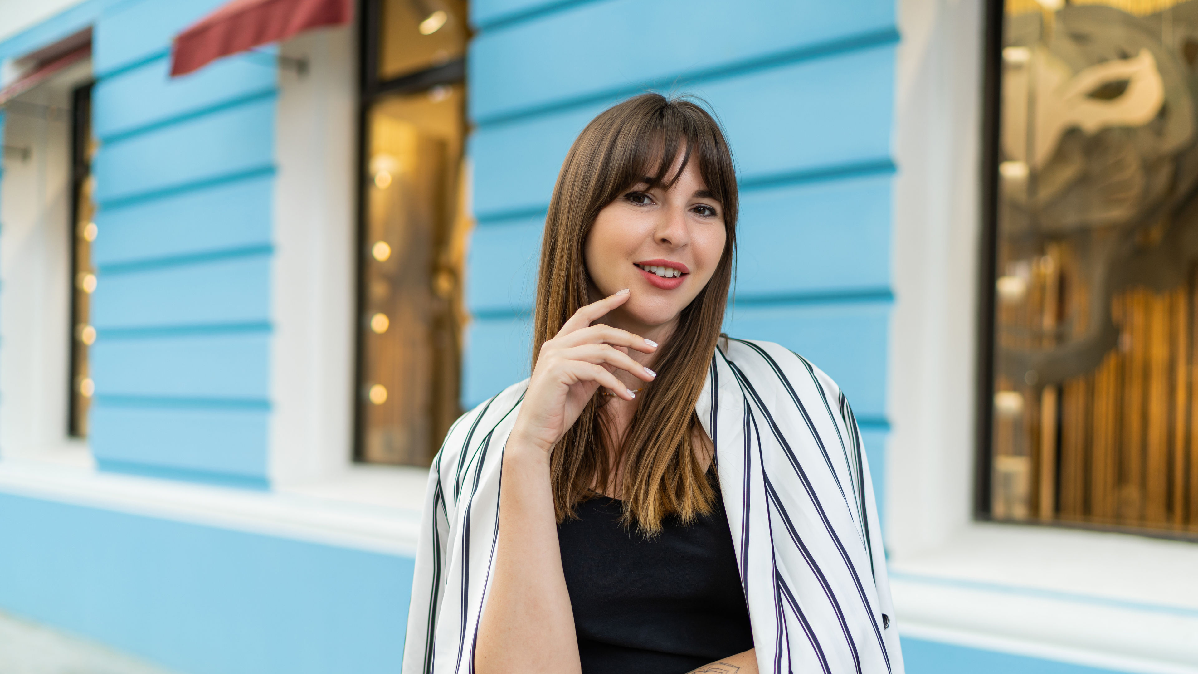 Woman Posing on City Street   