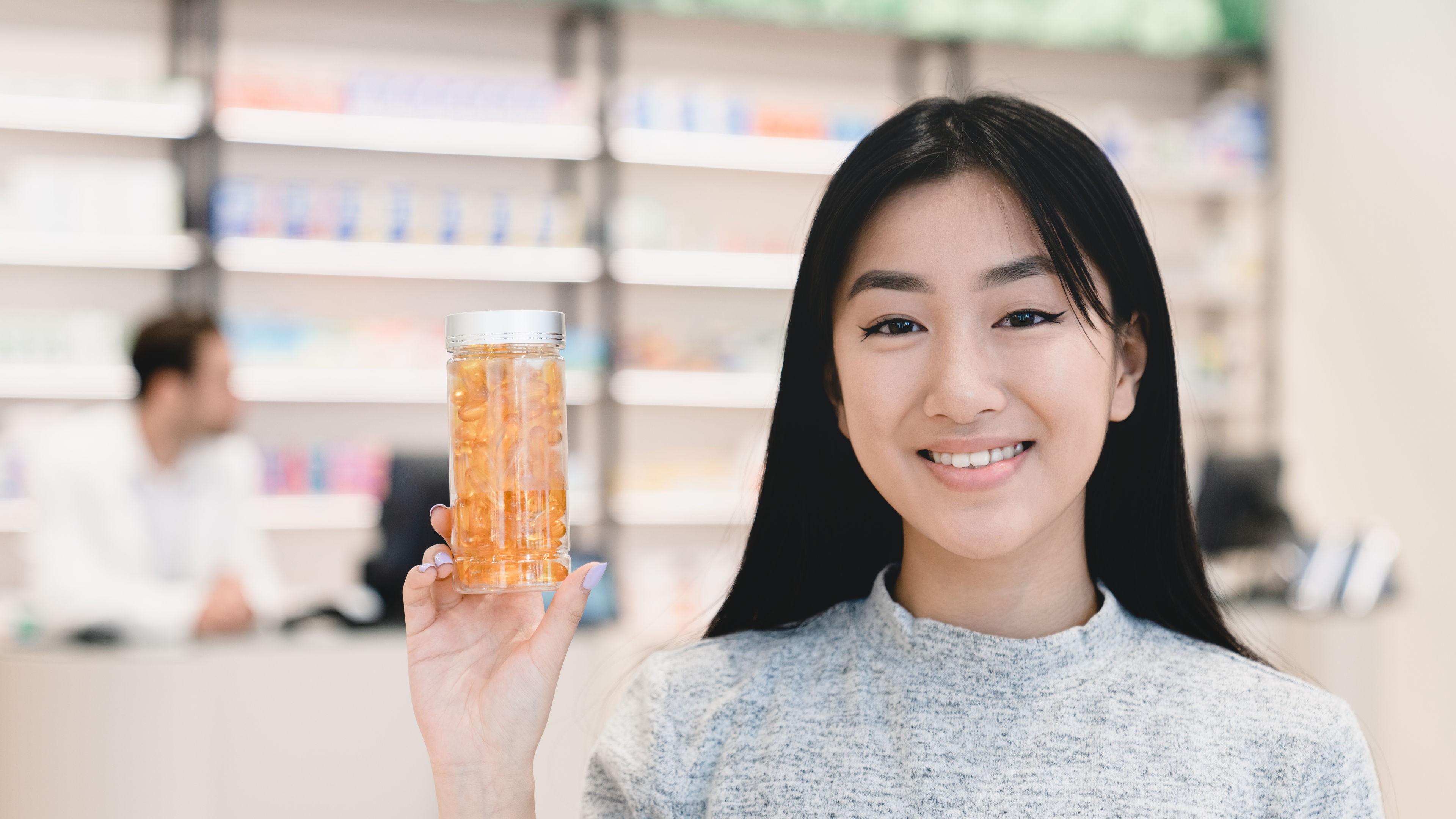Woman showing supplements