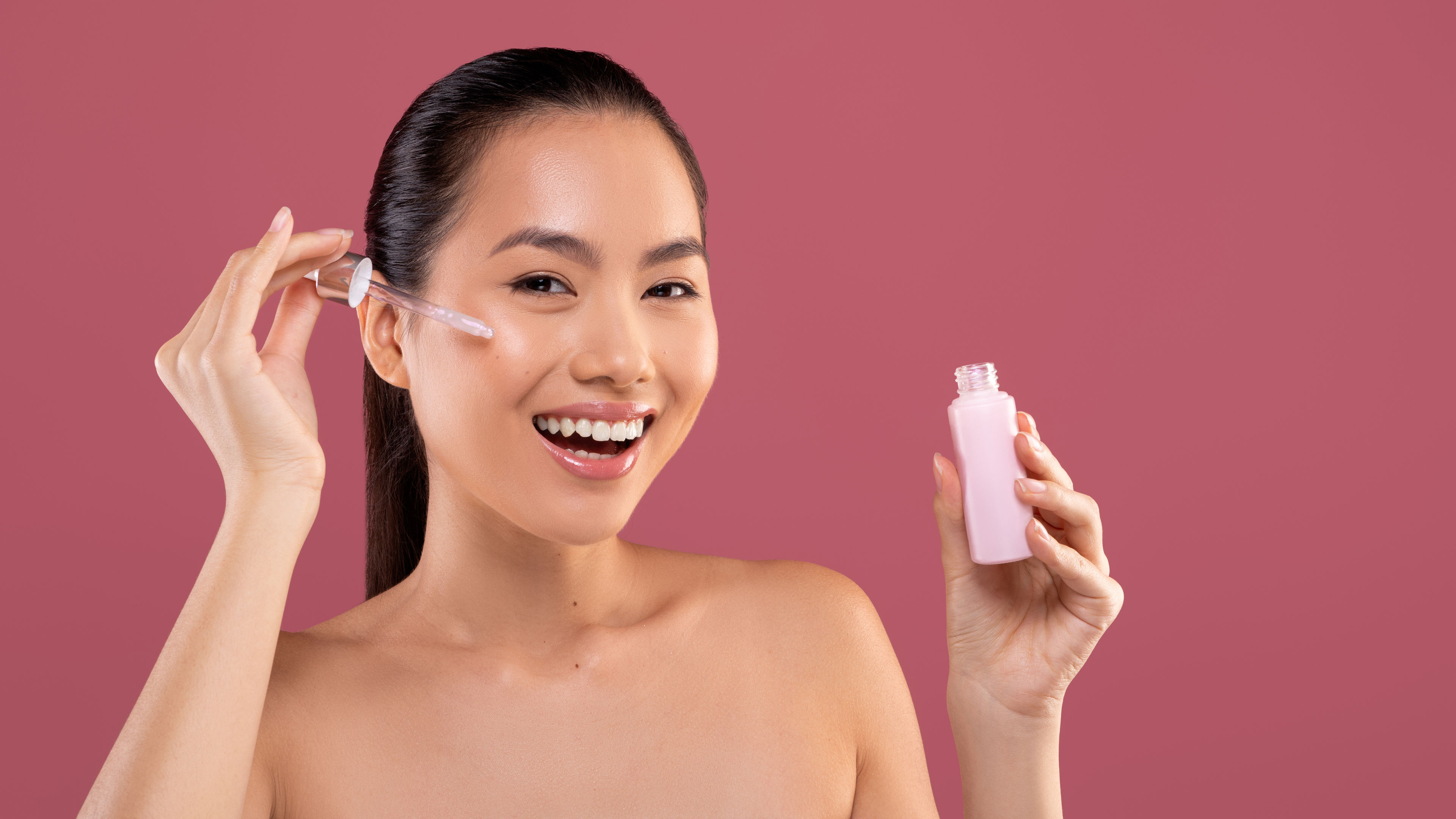 Woman Using Serum for Skincare 