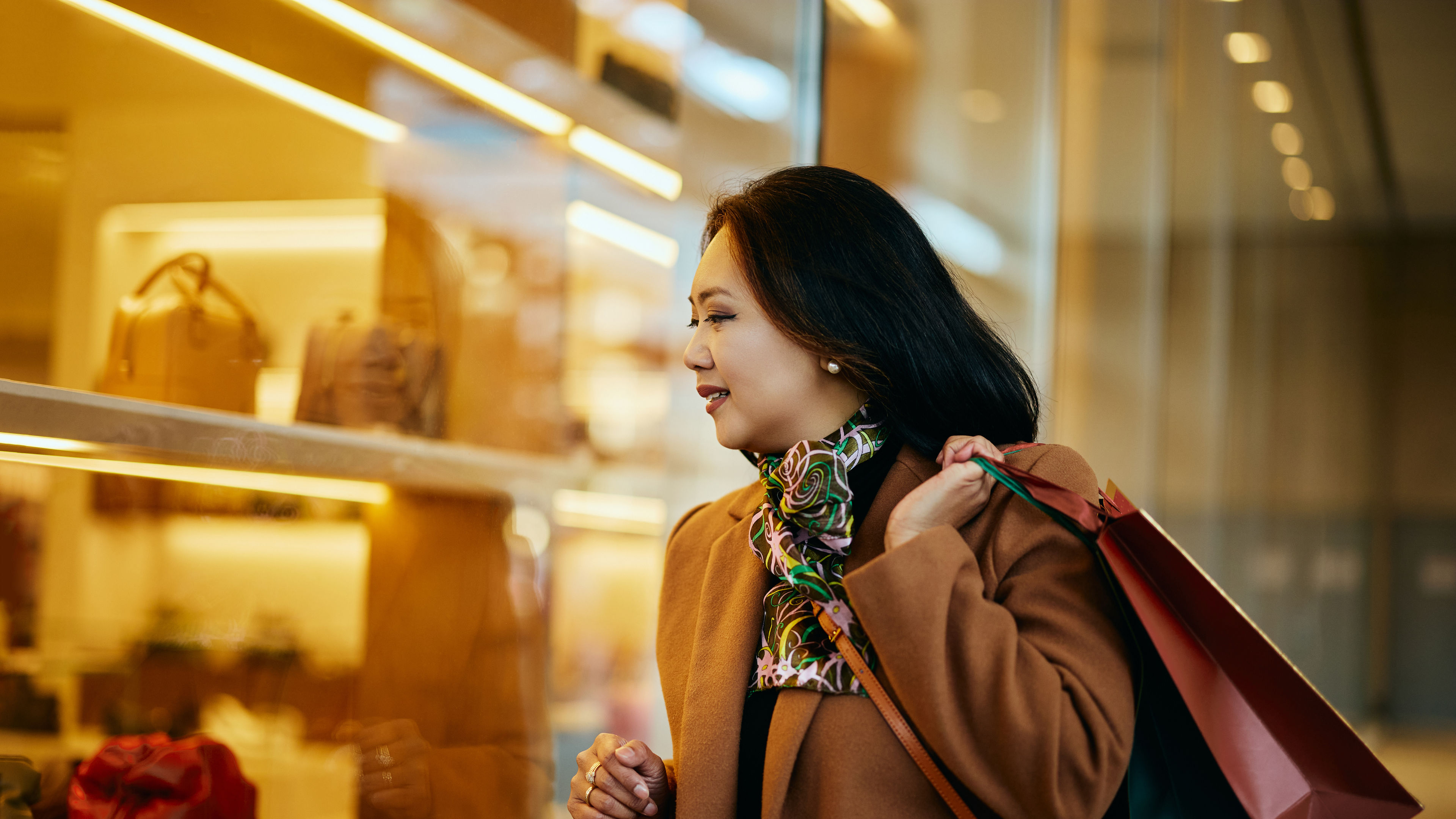 Image of a woman window shopping 