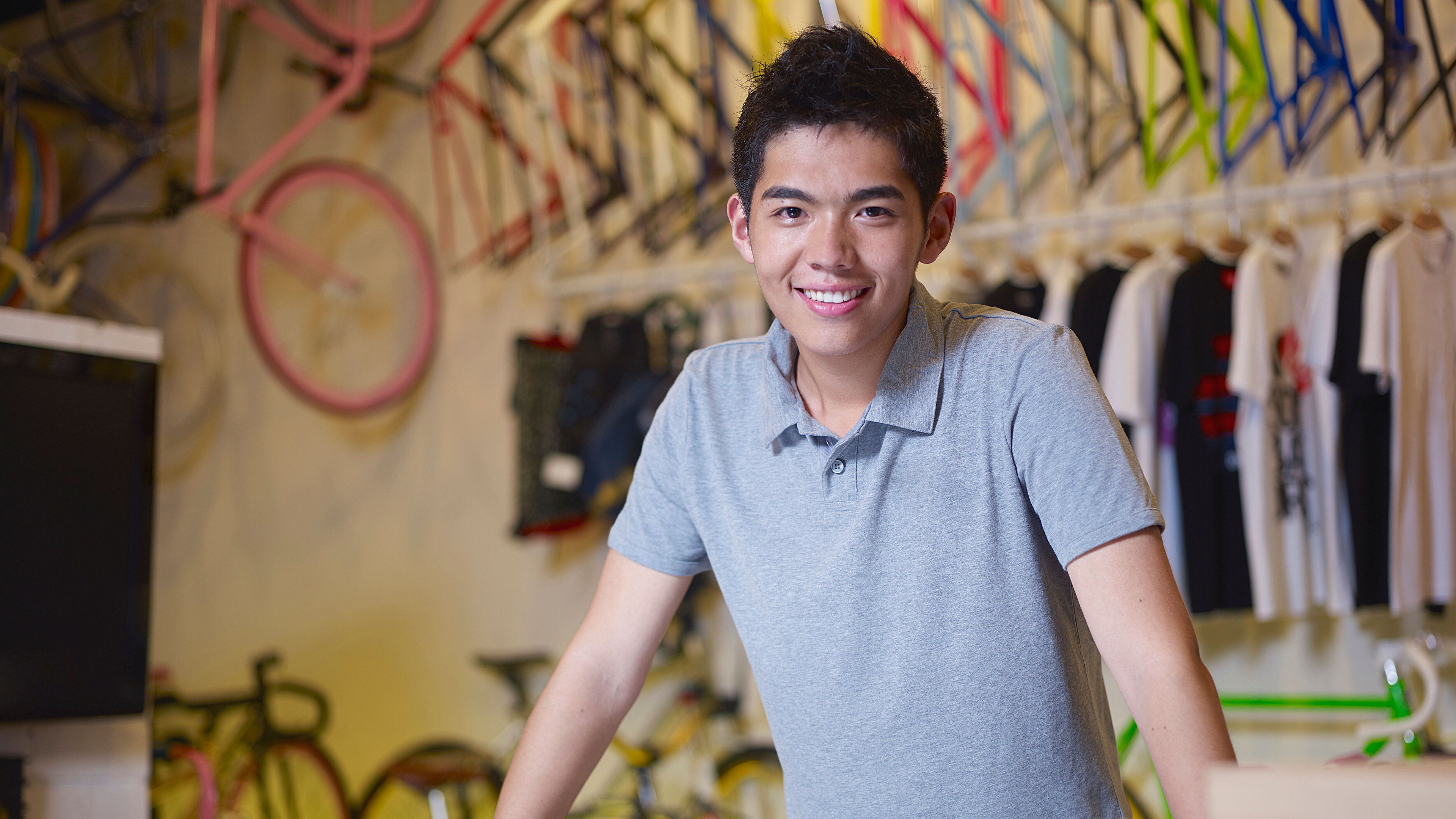 Young man with a friendly smile standing
